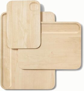 This image shows the result of Caraway 4-Piece Cutting Board Set