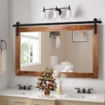 This is image shows the result of COGOOD Farmhouse Barn Door Mirror